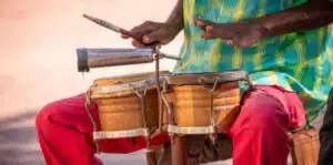 Street musician playing drums in Cuba