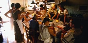 Group cooking at a table in Tuscany, Italy