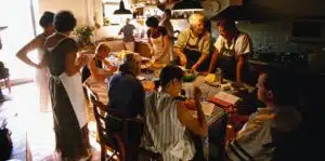 Group cooking at a table in Provence, France
