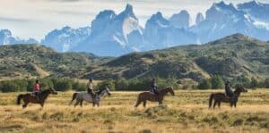 Horseback riding in front of the Andes
