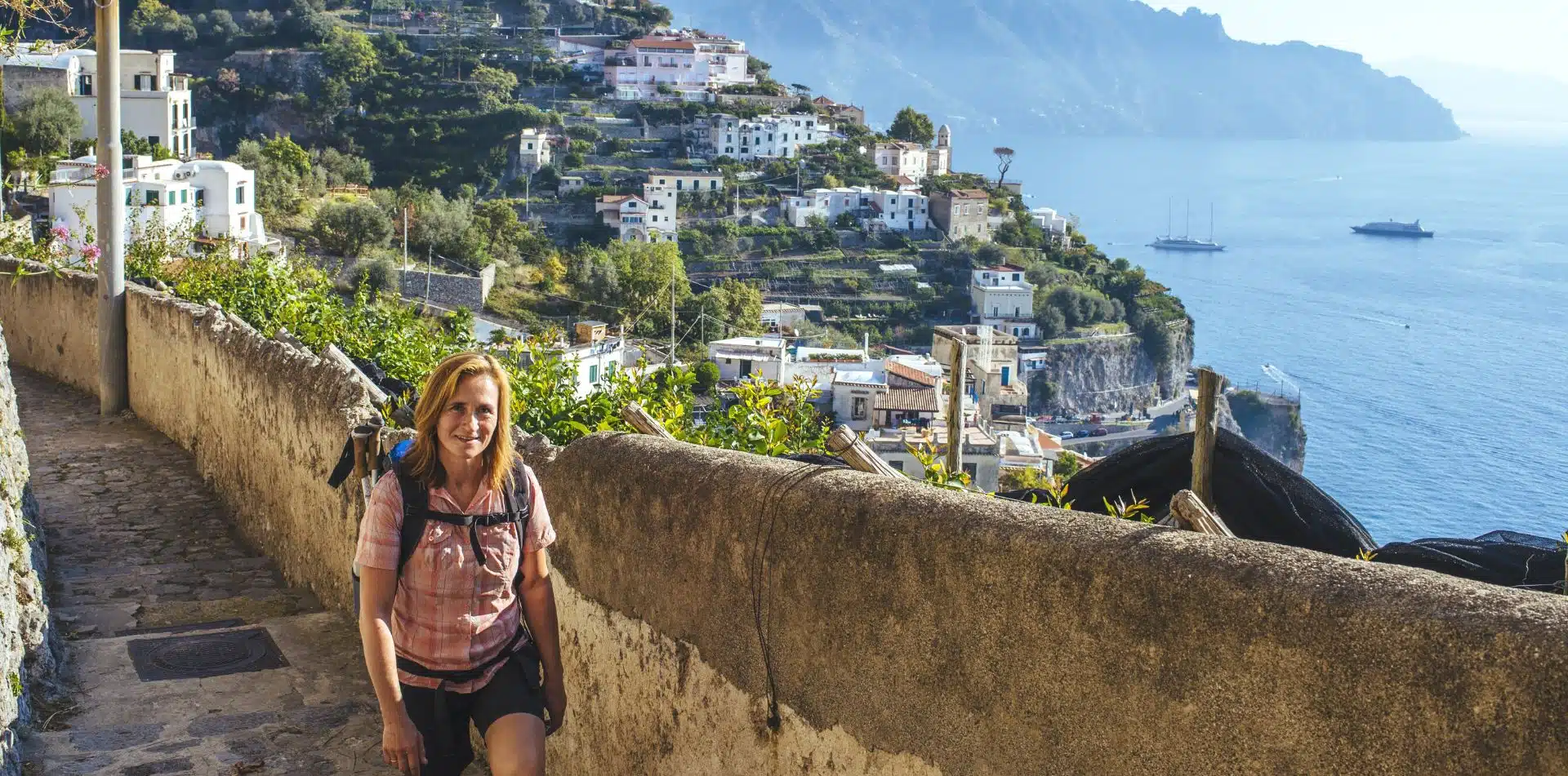 Traveler walking along the Amalfi Coast in Italy