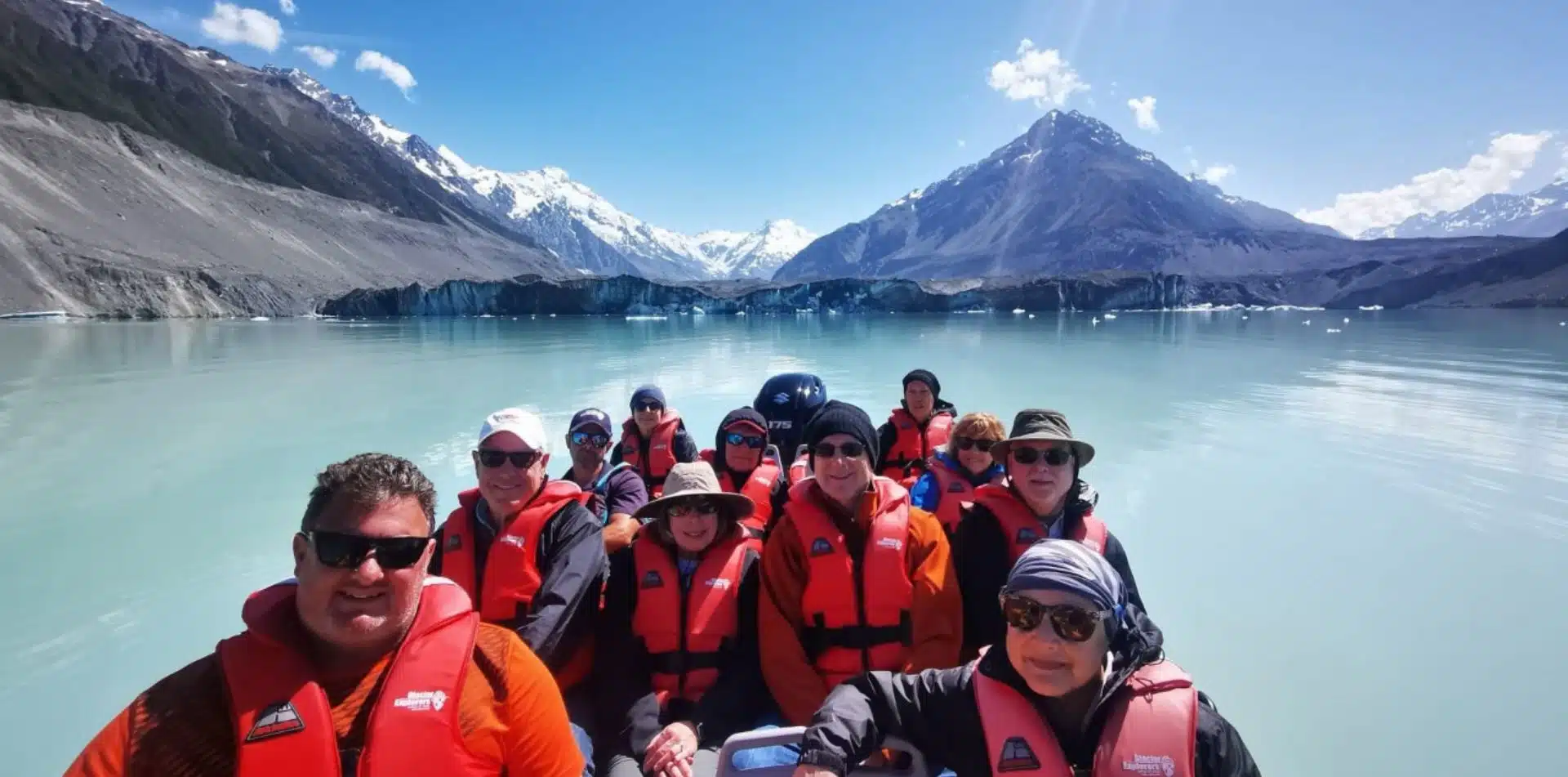 Travelers enjoying a boat ride in New Zealand