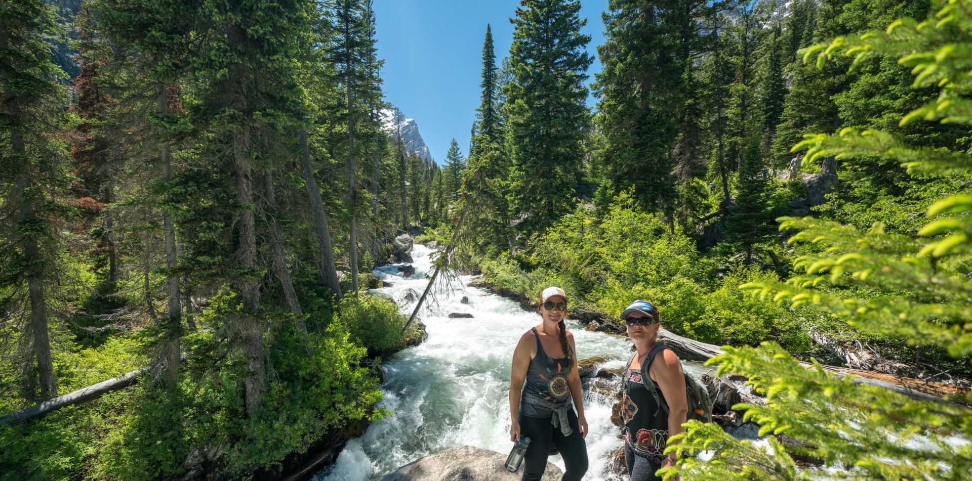 Travelers hiking in Grand Tetons