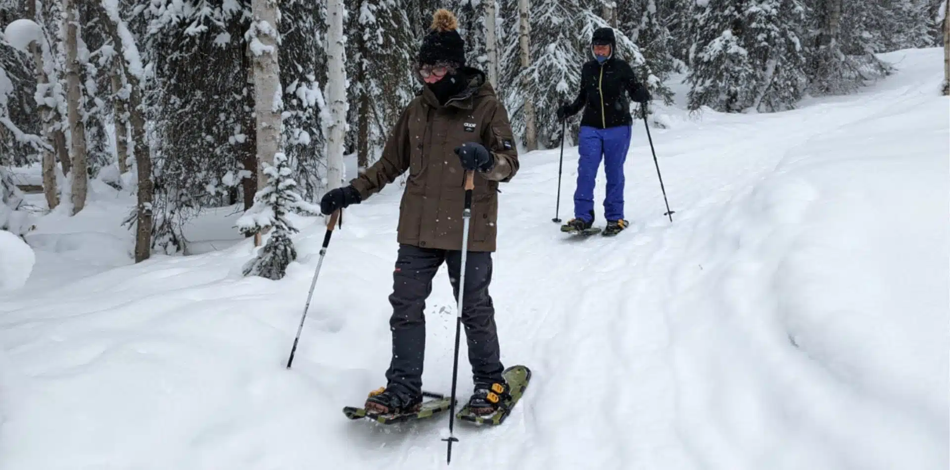 Guests enjoying a snowshoe excursion in Alaska