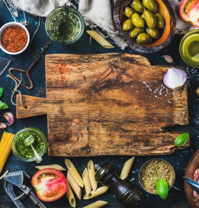 A cooking board with various vegetables.