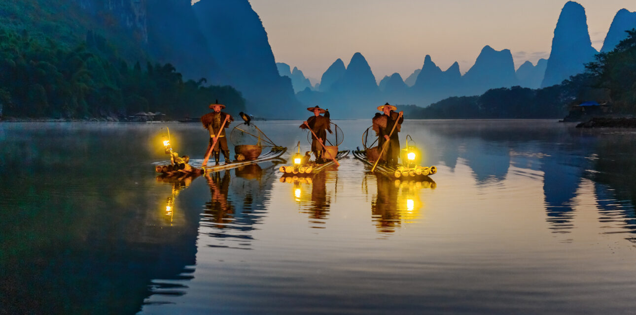 people riding boats in Asia.