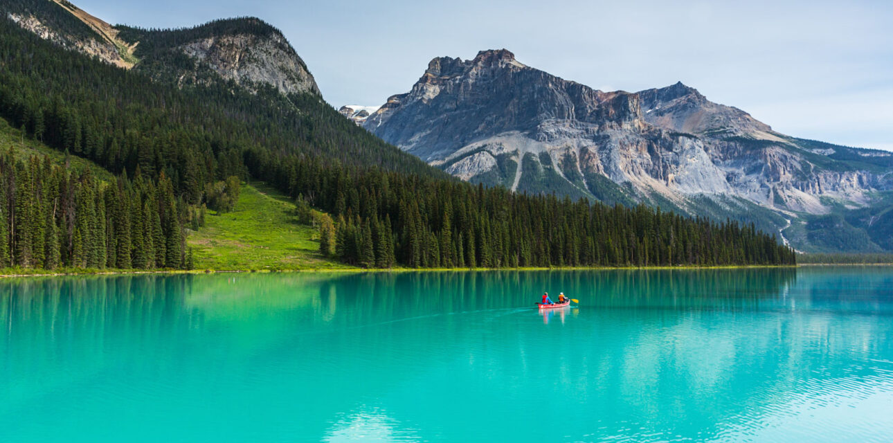 A lake in front of the Canadian Rockies