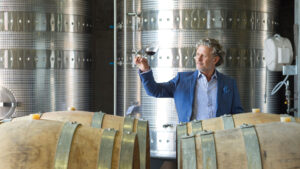 A man testing beer in barrels in Croatia