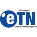 eTurboNews logo.