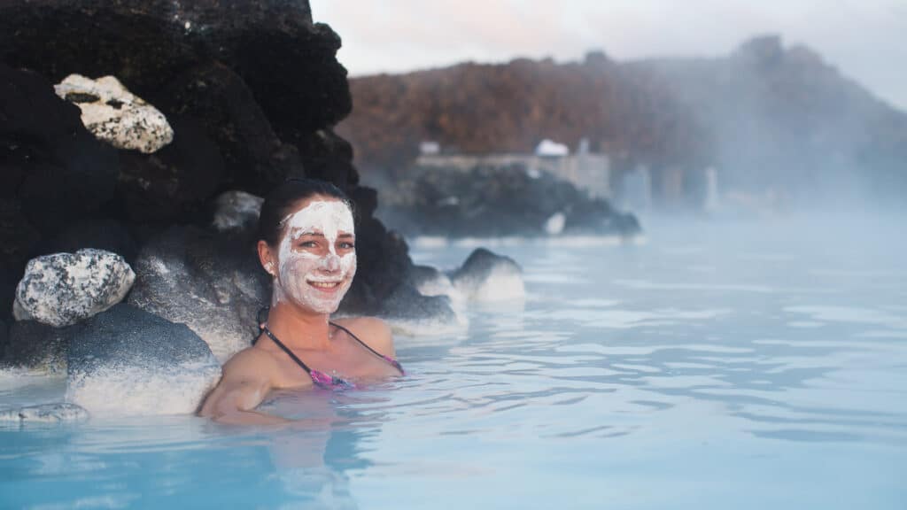 A woman soaking in the Blue Lagoon in Iceland.
