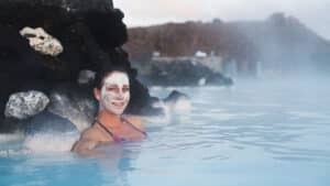 A woman in a hot spring in Iceland.