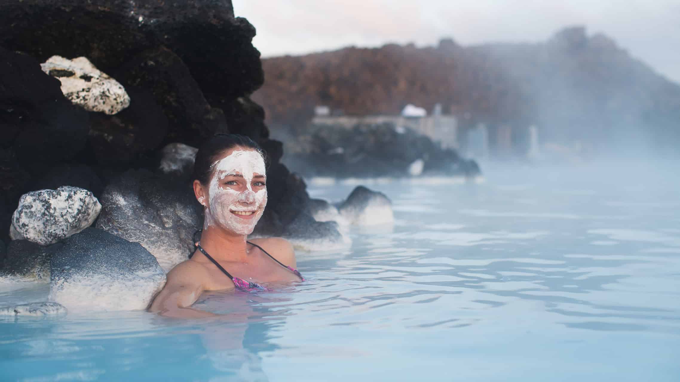 A woman in a hot spring in Iceland.