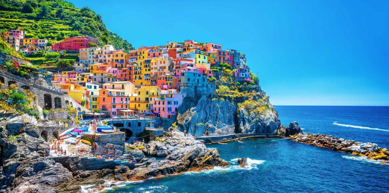 A colorful cliff on the coast of Italy.
