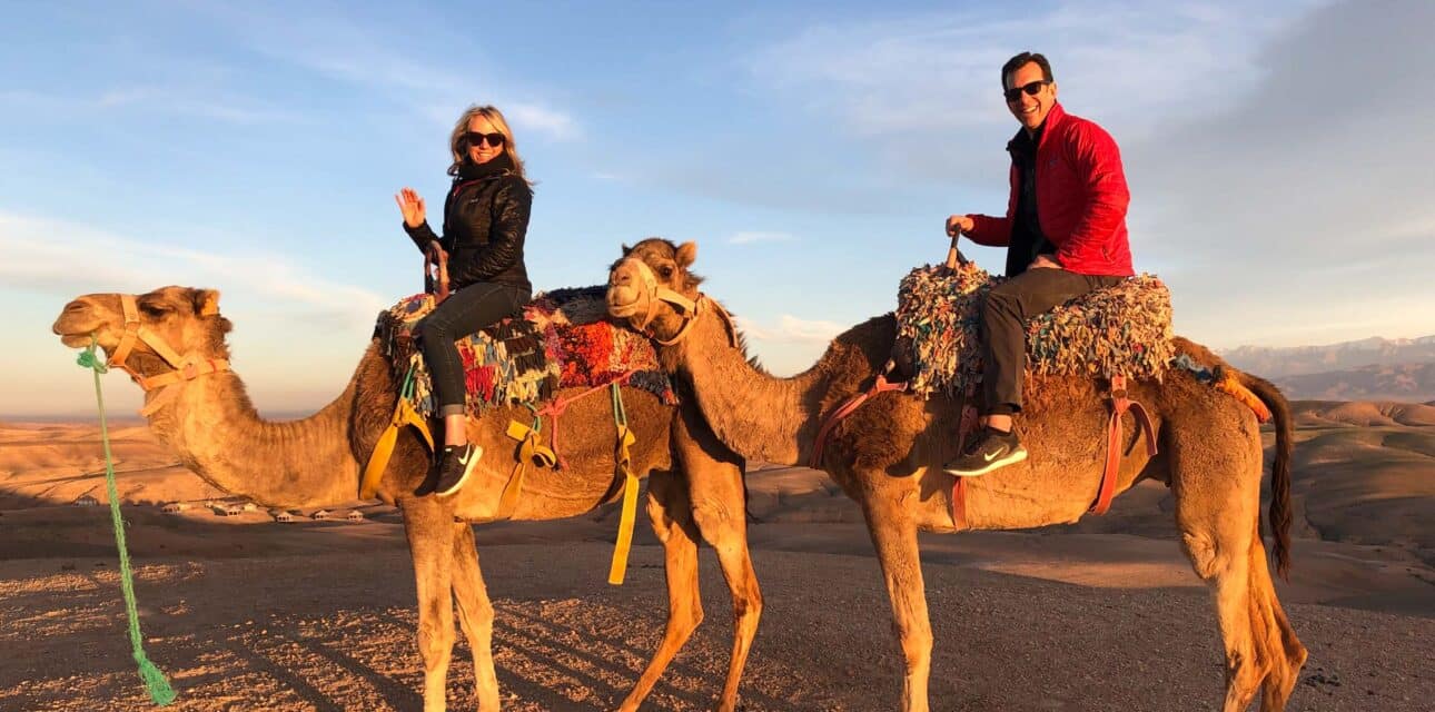 Two people on camels.