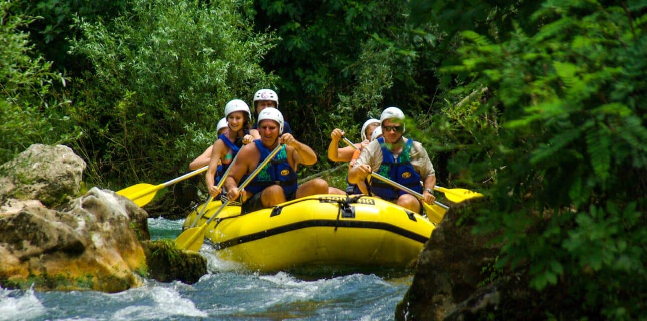 A group white water rafting.