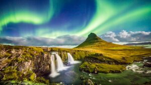 European northern lights and waterfall.