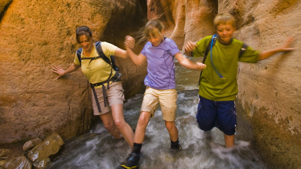 Mom and two kids in Grand Canyon slot.