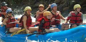 People white water rafting in Alaska.