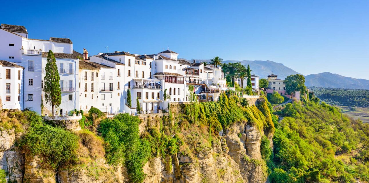 A cliff in Spain with white houses.