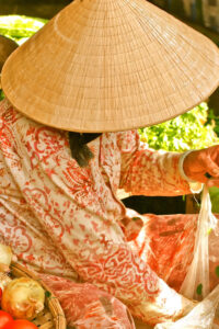 A person in tradition Vietnamese clothing.