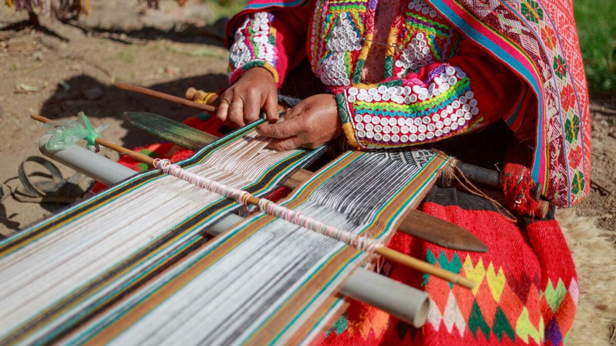 A woman weaving .