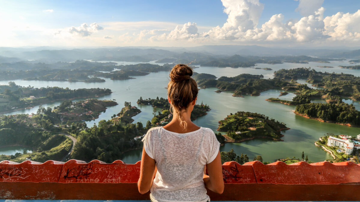 A woman looking out into the water.