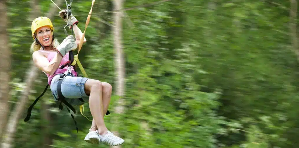 Woman ziplining.