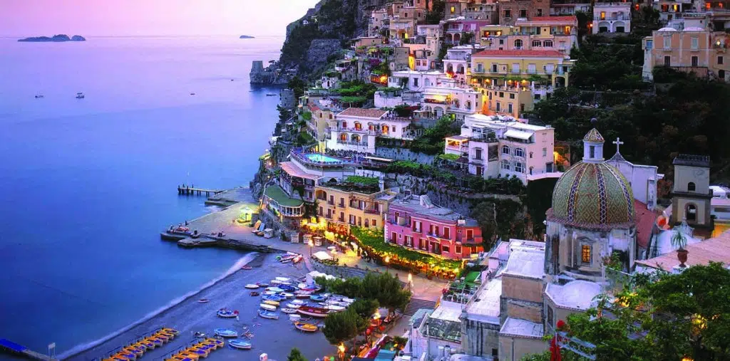 The sun sets along the beautiful Amalfi Coast in Italy 