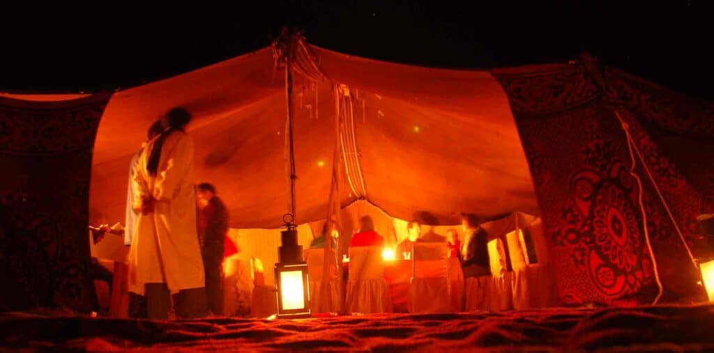 Luxury desert encampment at night