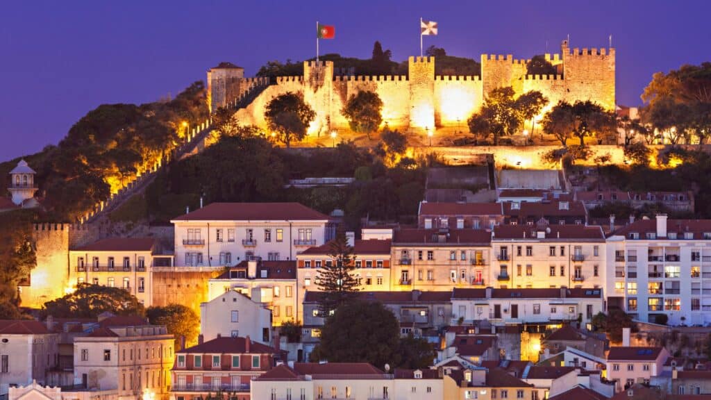 Castelo de S. Jorge lit up at night in Lisbon, Portugal