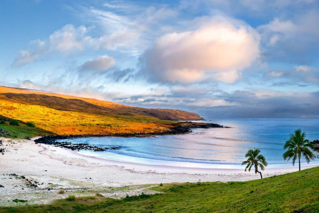 Cool off at Anakena Beach on Easter Island with its beautiful white sand and scenic views