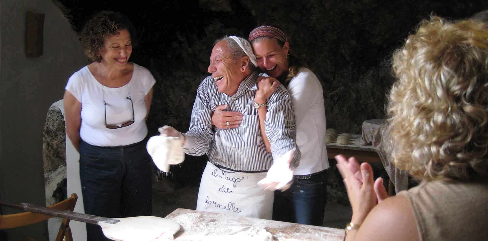 Friends Making Pizza in Italy