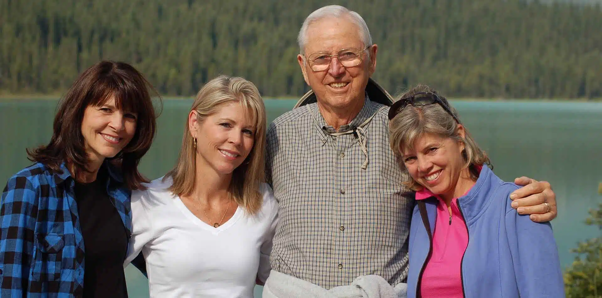 Family on Lake in Canadian Rockies