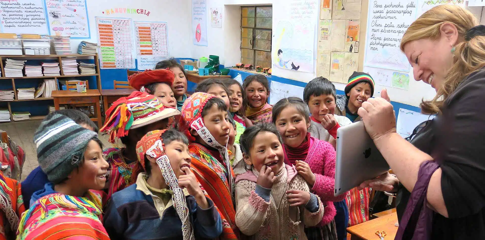 Traveler with Peruvian School Children