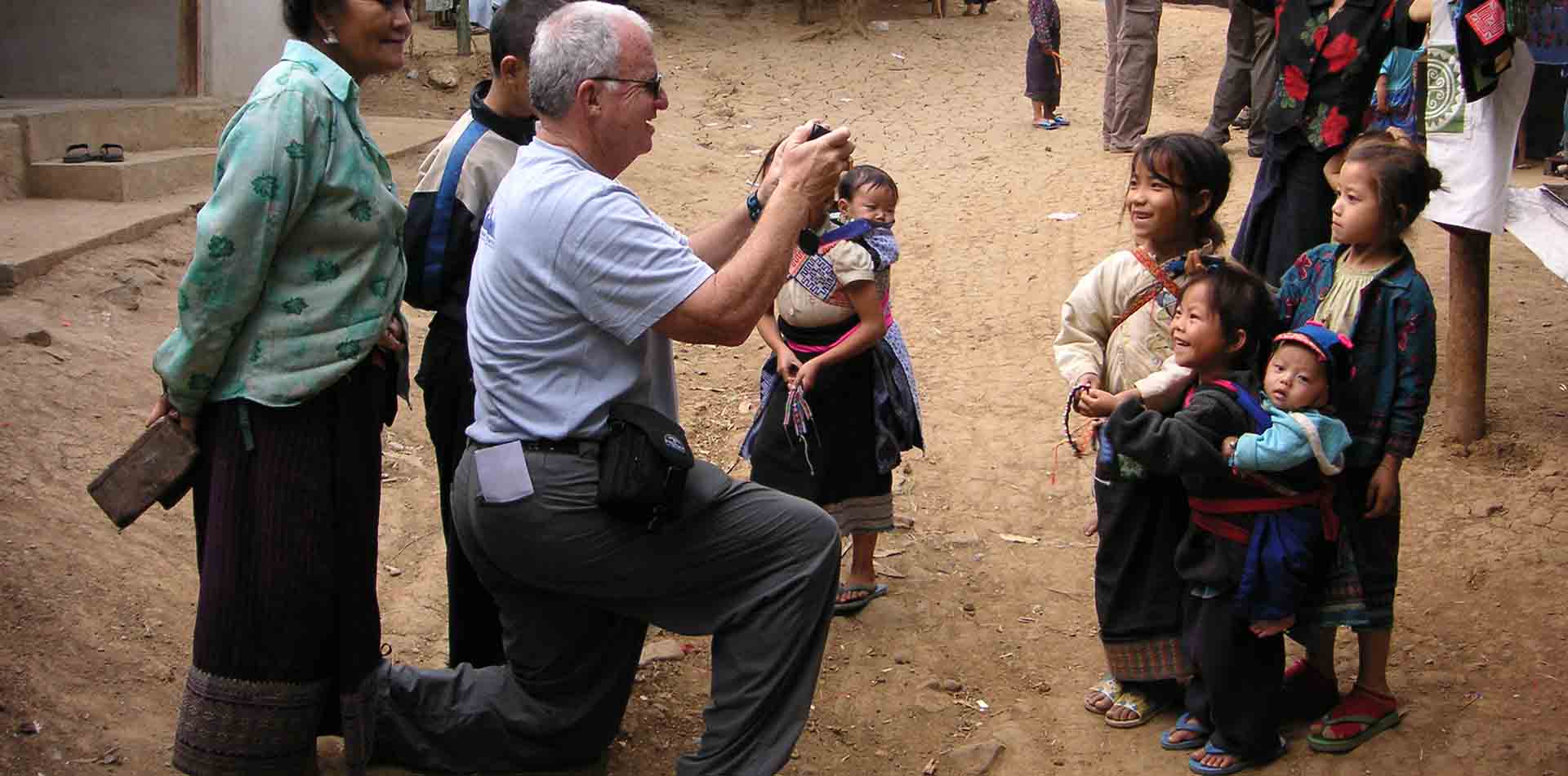 Traveler meeting village children in Vietnam