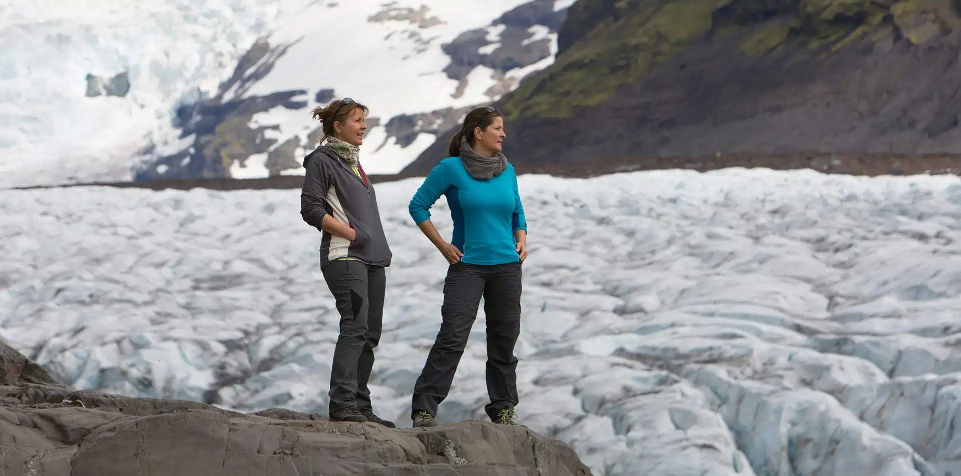 Women overlooking a glacier in Iceland