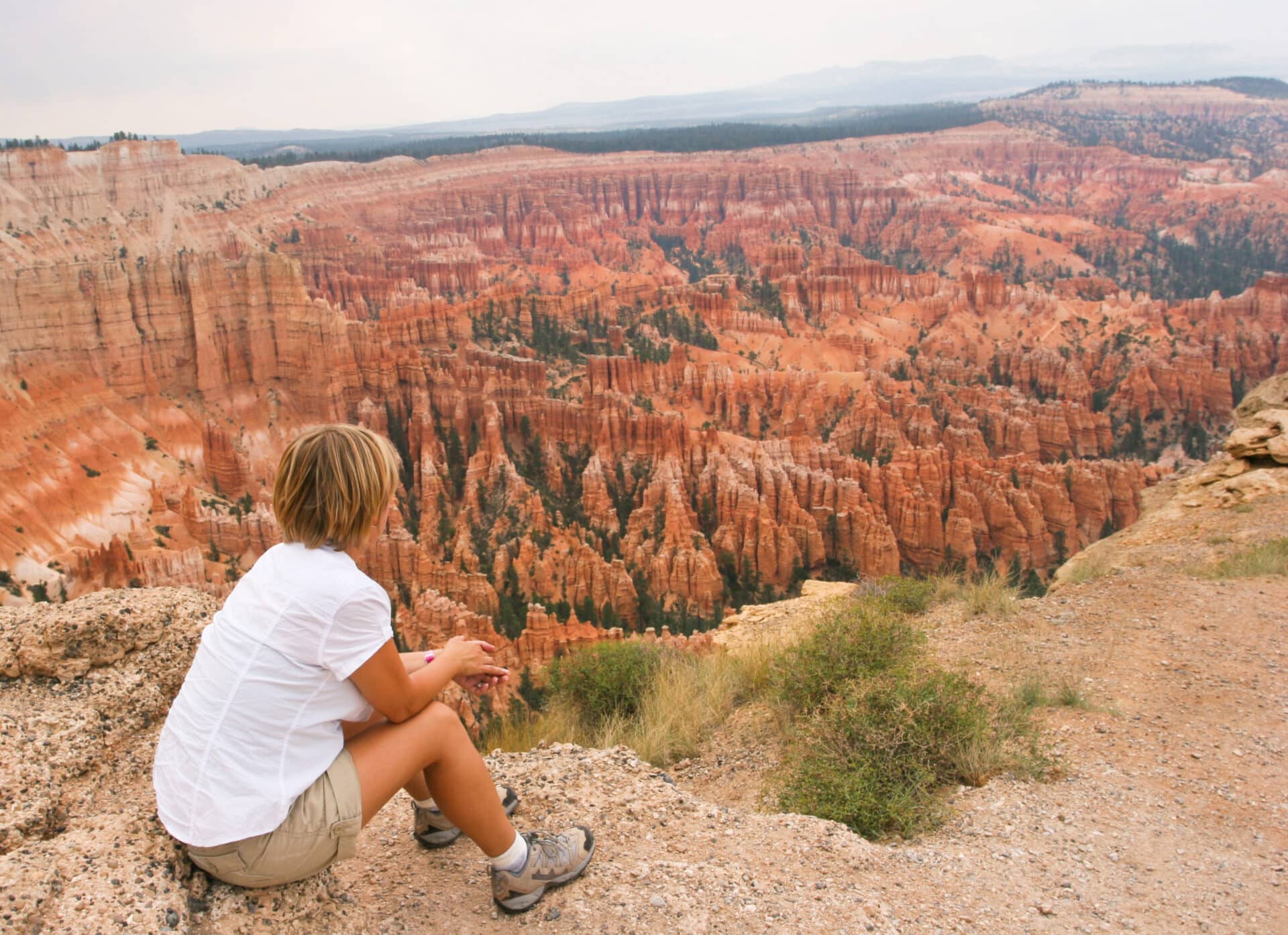 Woman overlooking hoodoos in Bryce Canyo