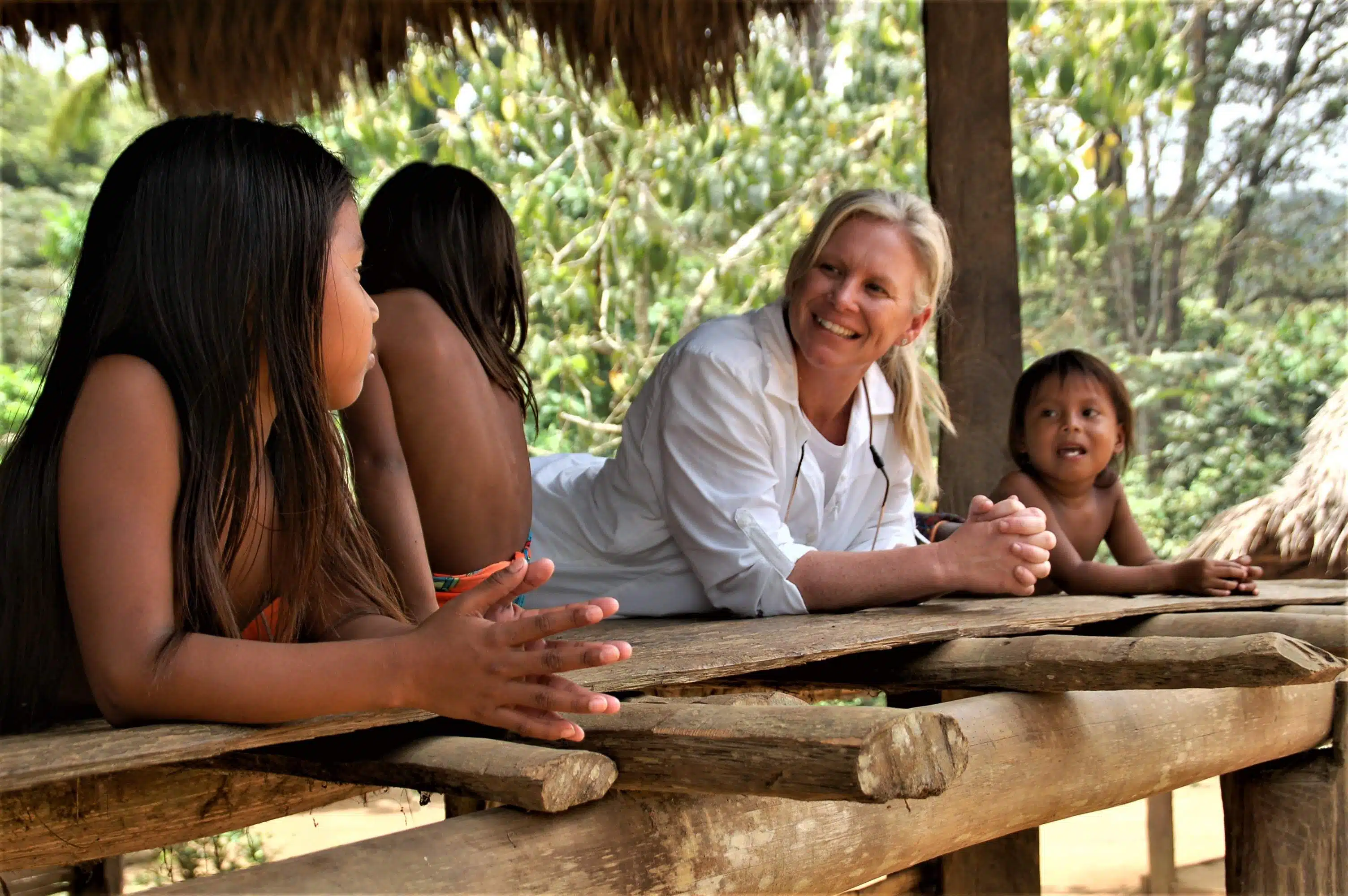 Traveler talking with Embera tribe girls