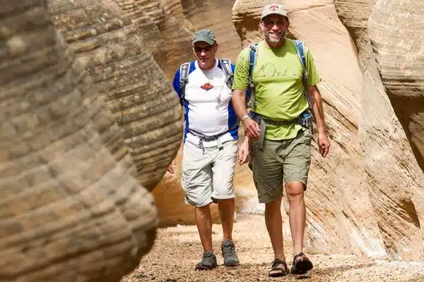 Travelers exploring the Zion Narrows