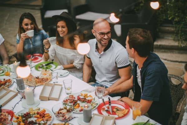 Travelers dining together in Florence, Italy