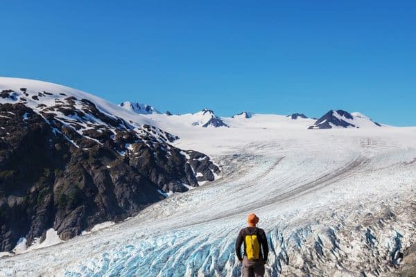 Person hiking up the Harding Icefield