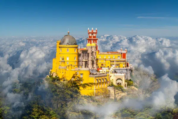 Pena Palace in Sintra, Portugal, surrounded by clouds