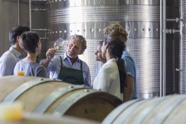 A local Croatian guide demonstrating Istria's white wine