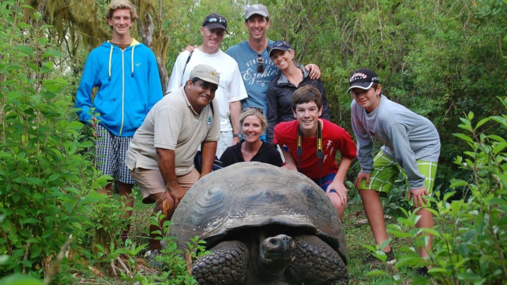 A family admiring the wildlife in the Galapagos
