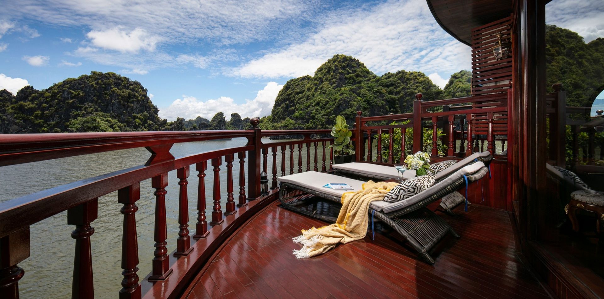 Relax on board a luxury junk boat as you sail around Halong Bay