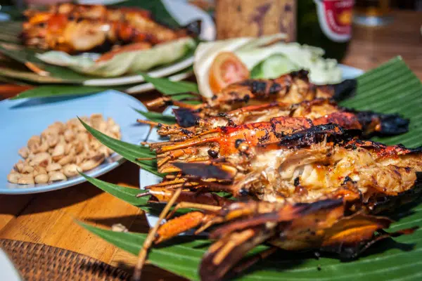 Plate of grilled lobster on banana leaves in the Galapagos