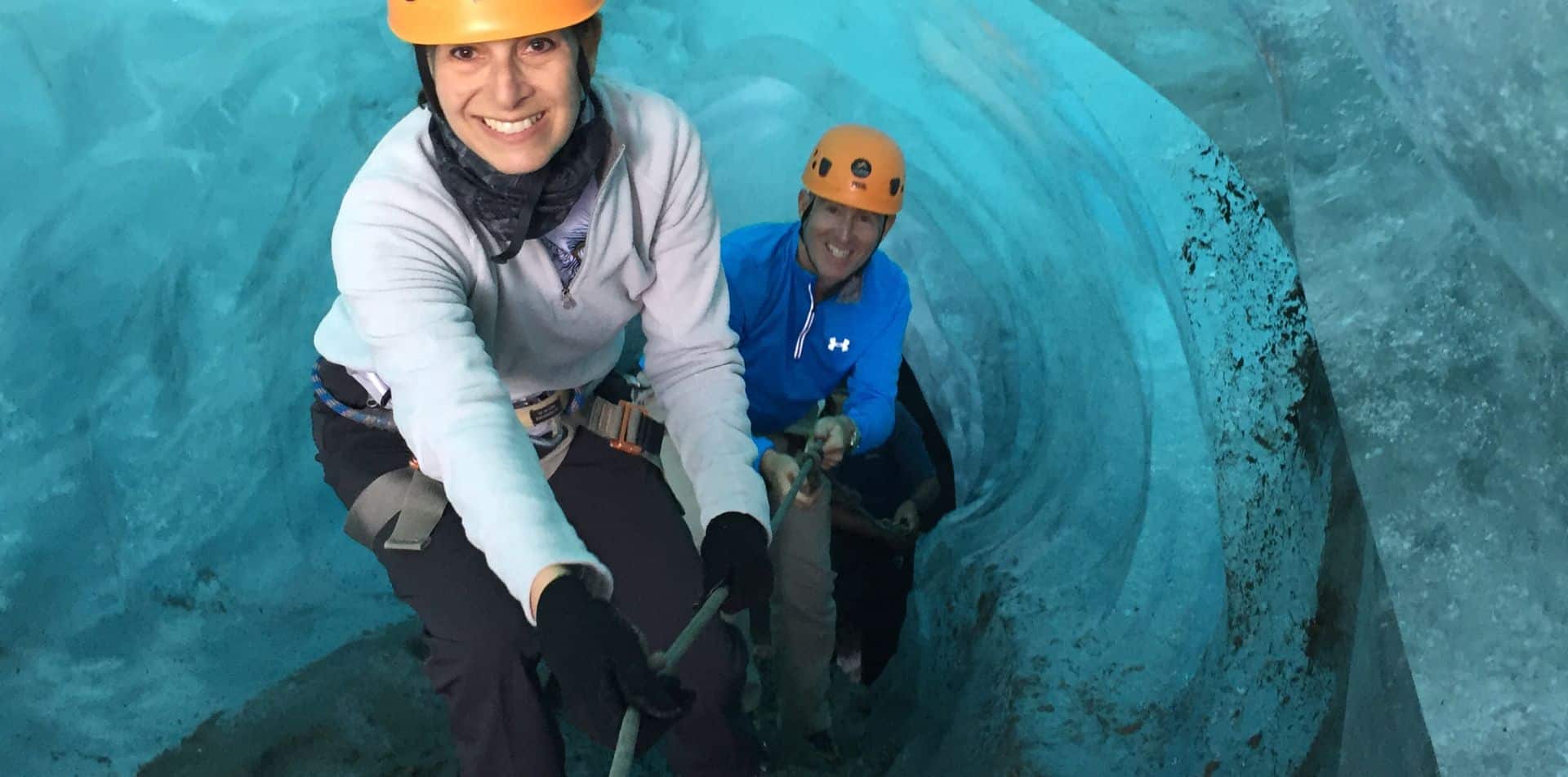 Explore an ice cave while on tour in Iceland