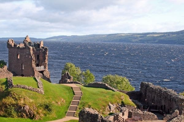 Explore the ruins of Urquhart Castle and the Loch Ness in Scotland