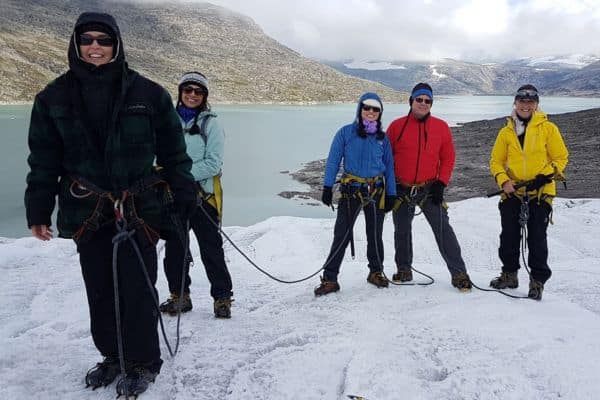 Guests on Jostedal Glacier in Norway, exploring the ice with their Classic Journeys guide