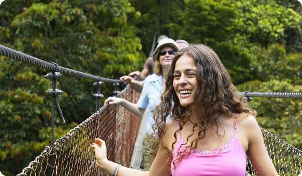 Family on a hanging bridge in Costa Rica